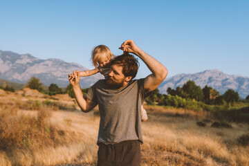 Family time father and child daughter playing together outdoor active healthy lifestyle vacations travel together with kid happy emotions summer vibes