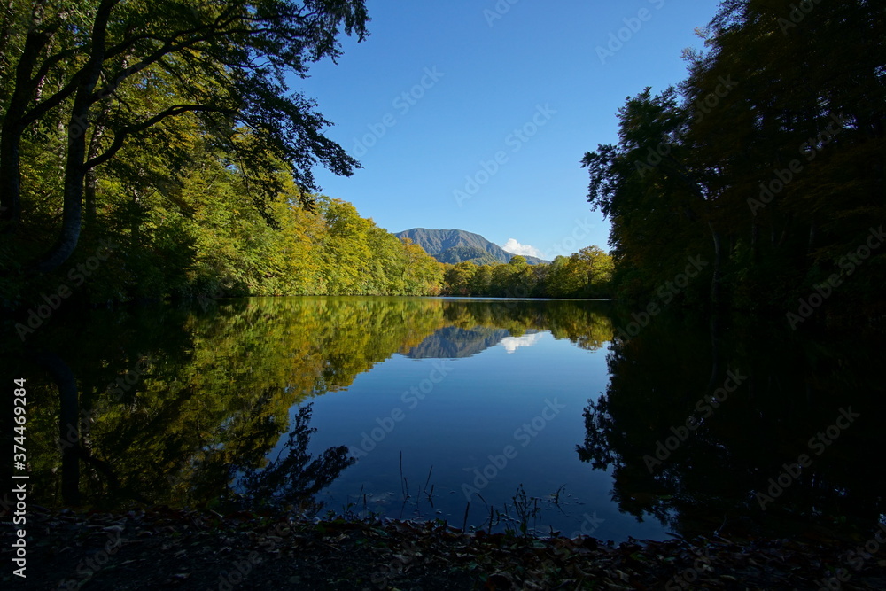 Mountain Lake in Early Autumn Sunlight, Nagano, Japan Mountain Lake in Early Autumn Sunlight, Nagano, Japan