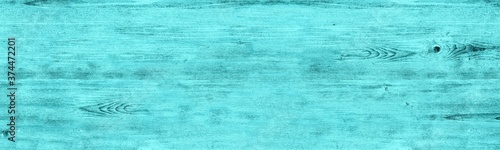 Shabby bright turquoise wooden pattern. Light teal wood texture. Wide abstract background