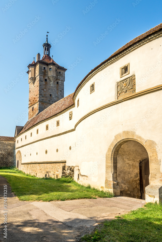 View at the Medieval town wall and Klingentorturm tower in Rothenburg ob der Tauber - Germany