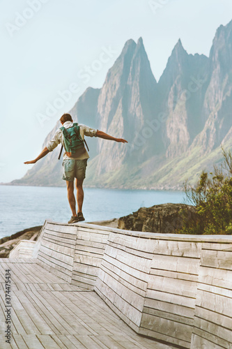 Tablou pe pânză Man traveller exploring Norway traveling solo summer vacations active healthy li