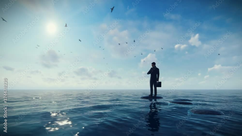 Businessman with briefcase standing on a pebble on a lake surrounded by seagulls, panning