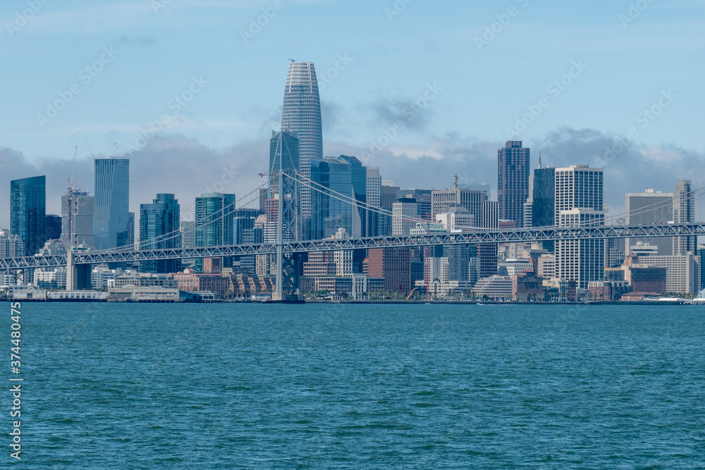 Downtown San Francisco and Oakland Bay Bridge on sunny day