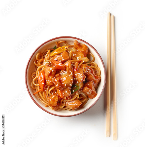 freid noodles with sweet and sour pork in bowl photo