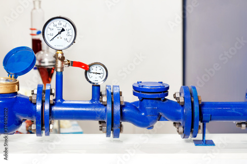 Water metering and pressure system using manometers, close-up.