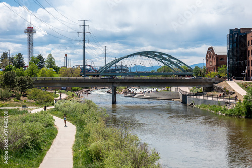 фотографія Bridge over South Platte River and Shoemaker Plaza in Confluence Park