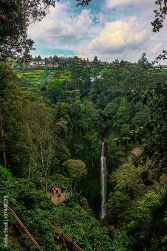 forest in the mountains watter fall, curug cimahi bandung indonesia photo