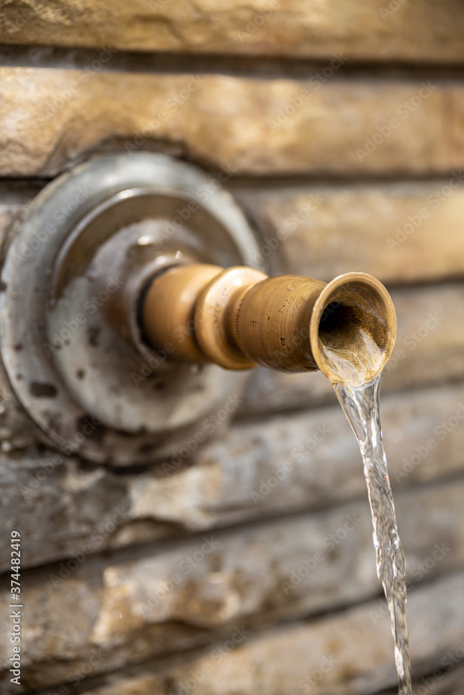 Close-up of the spout of a mountain fountain.