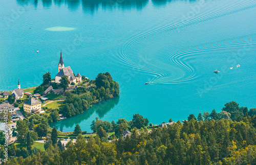 View of the Worthersee lake with Maria Worth church, Carinthia, Austria photo