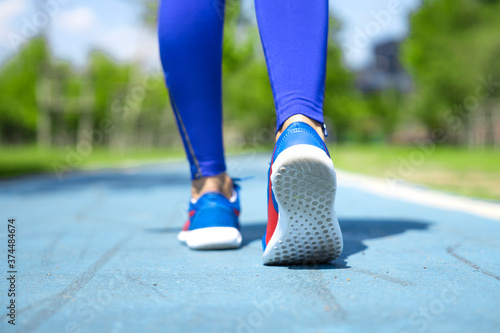 Close up shot of runner's shoes