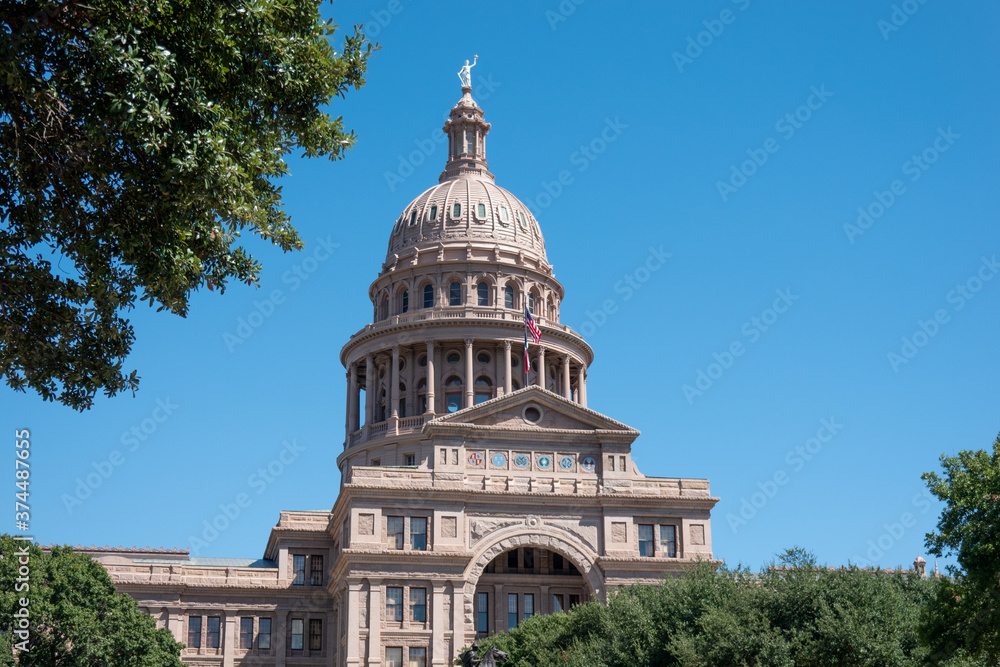 Texas state capitol building under perfect sunny days with blue sky in Austin Texas