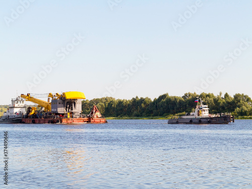 Wallpaper Mural Kasimov, Russia - July 24, 2015: Barge goes along Oka River near town of Kasimov on summer day. Torontodigital.ca
