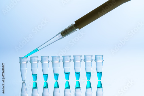  PCR Tube Strips Well  and Pipette in genetic research laboratory close up photo