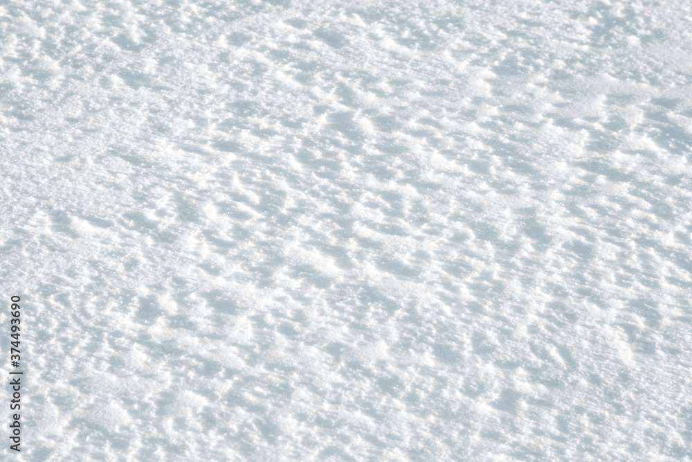 Abstract footprints on white snow as a background for any project Christmas