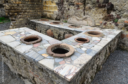 Ruins of Herculaneum. The remains of a public kitchen where the inhabitants of Herculaneum cooked food. Herculaneum is famous for its eruption of Mount Vesuvius in AD 79. Herculaneum, Italy