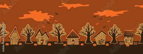 Halloween gingerbread houses. Spooky village. Seamless border. Silhouettes of houses and trees on an orange background. There are also bats, ghost and pumpkins in the picture. Vector illustration
