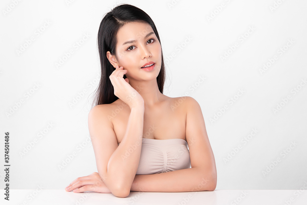 Beautiful Young asian Woman with Clean Fresh Skin, on white background, Face care, Facial treatment, Cosmetology, beauty and spa, Asian women portrait Beautiful Young asian Woman with Clean Fresh Skin, on white background, Face care, Facial treatment, Cosmetology, beauty and spa, Asian women portrait