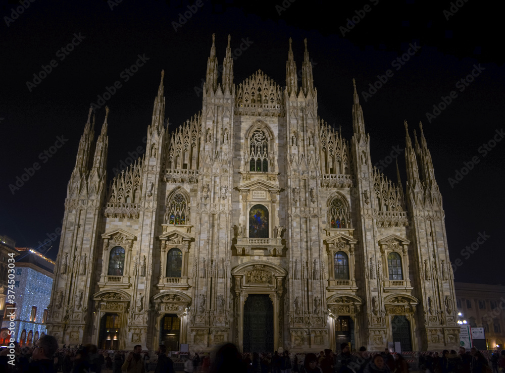 Milan's Duomo cathedral facade frontal view at night