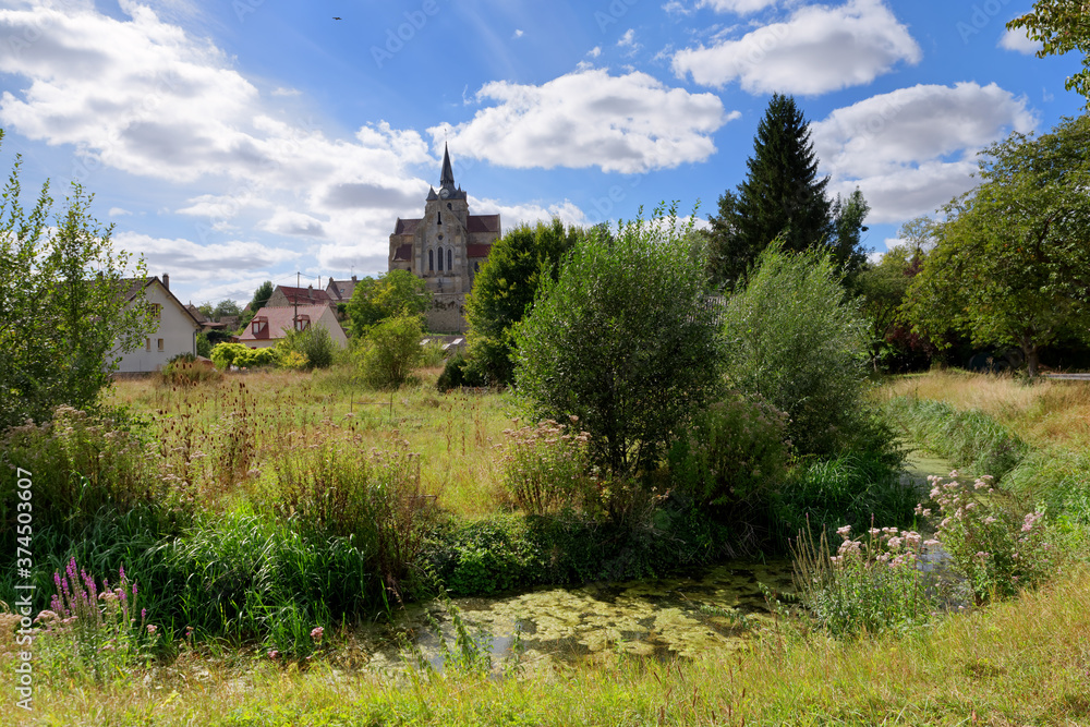 Church of Mareuil-sur-Ourcq village and Ourcq river in Seine et Marne country
