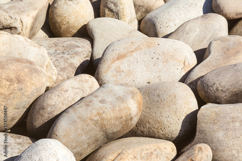 lot of stones close-up on beach  pebbles as textured background