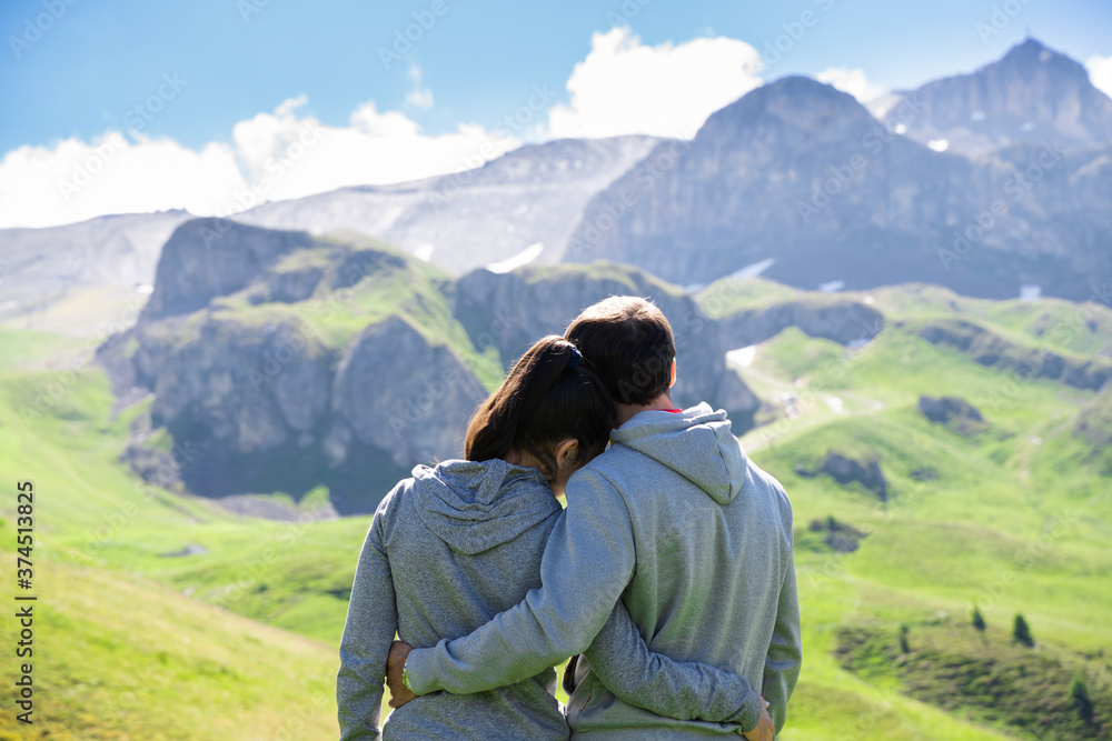 Romantic Family Couple In Mountains In Austria