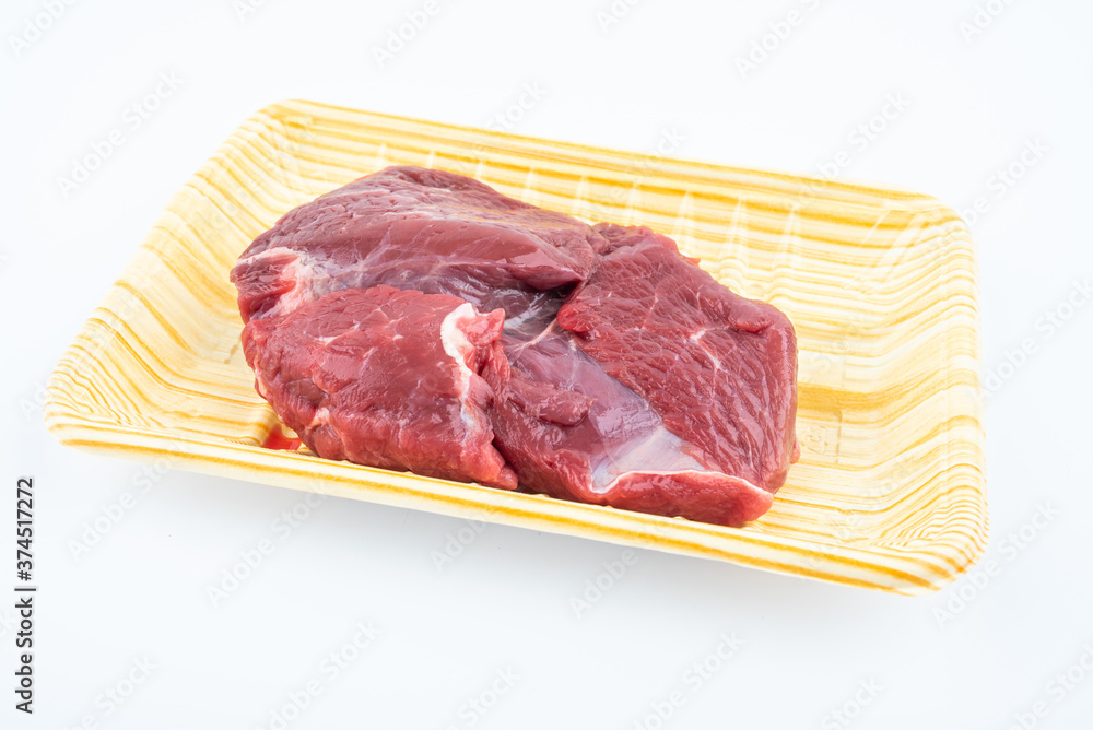 A box of fresh Australian beef on white background