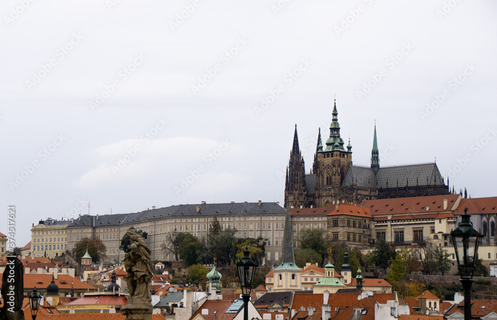 The St. Vitus Cathedral rising above the medieval roofs of Prague