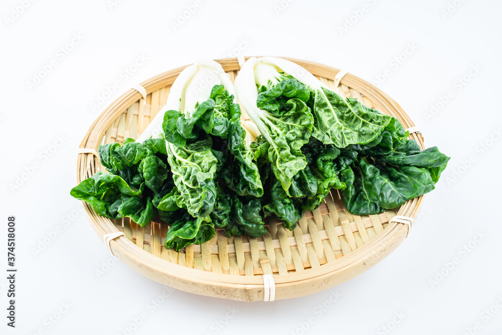 Fresh milk cabbage on a plate on white background Fresh milk cabbage on a plate on white background