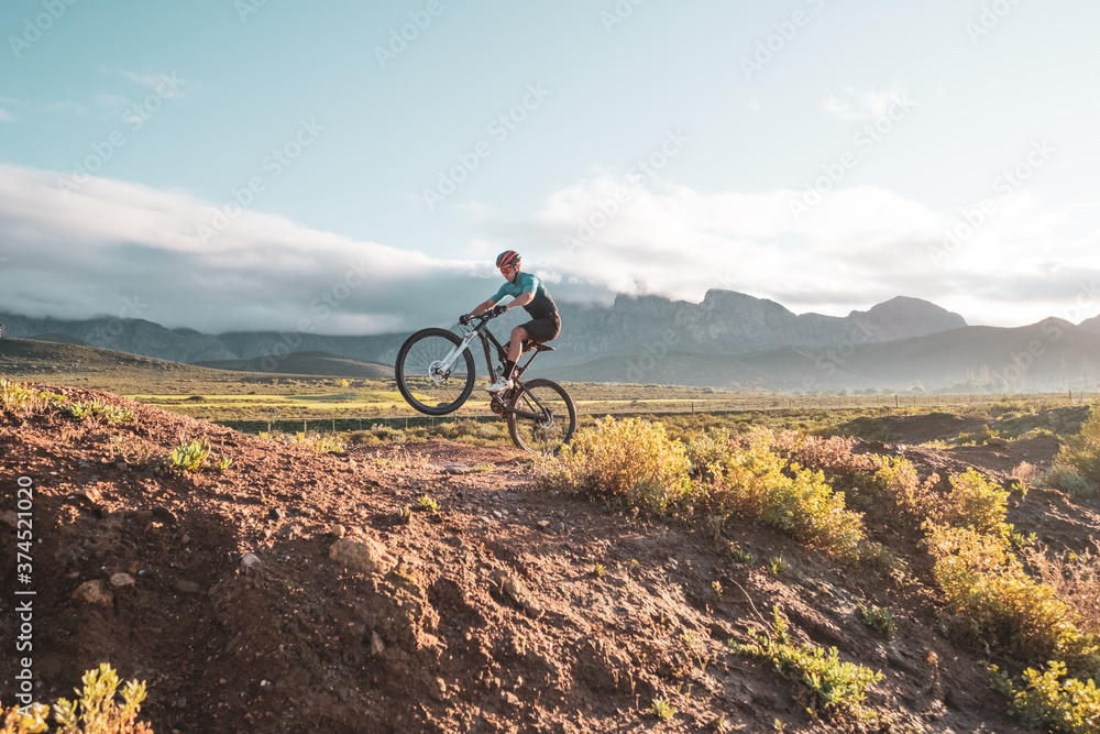 Obraz premium mountain biker on a track