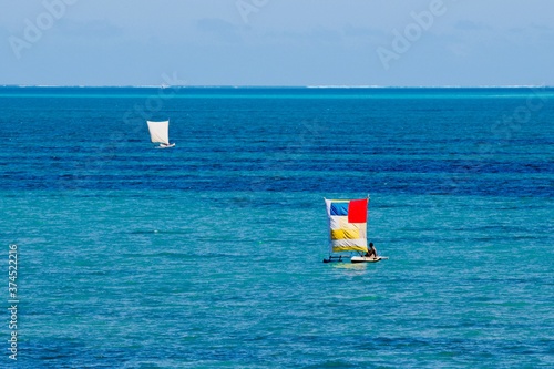 Fishermen traditional boat on the sea. Madagascar seascape.