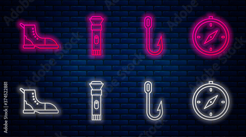 Set line Flashlight, Fishing hook, Hiking boot and Compass. Glowing neon icon on brick wall. Vector.