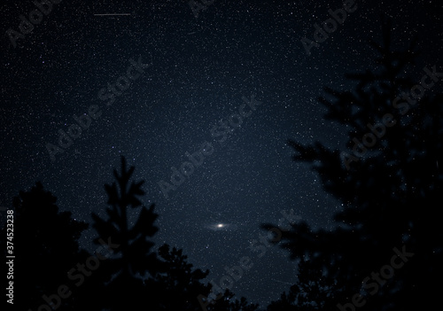Fototapeta Naklejka Na Ścianę i Meble -  night sky and the visible andromeda galaxy