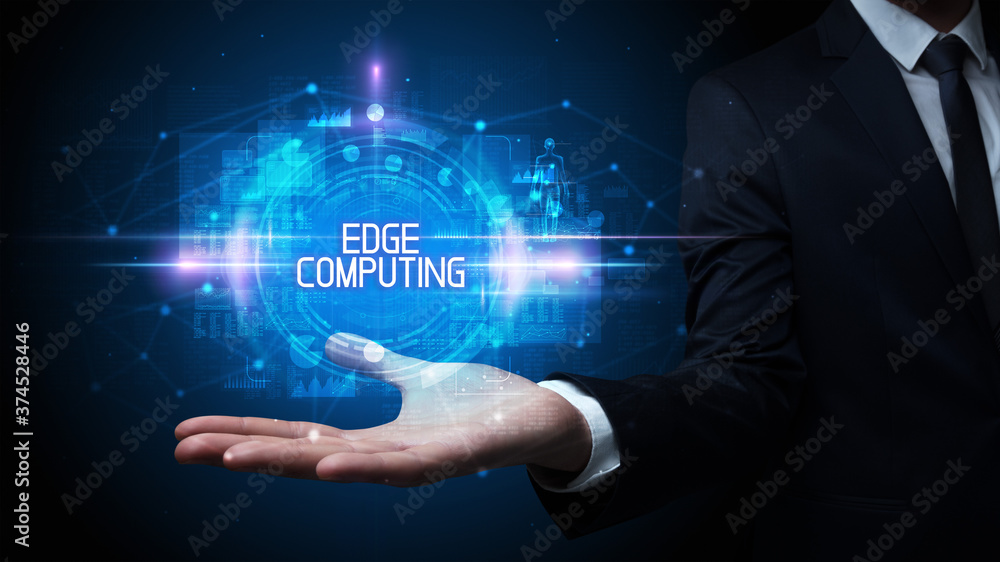 Man hand holding EDGE COMPUTING inscription, technology concept Man hand holding EDGE COMPUTING inscription, technology concept