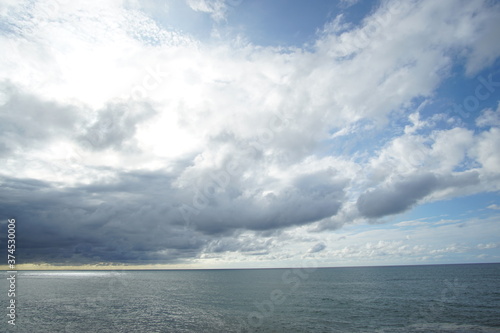 blue sea and cloudy sky over it. Blue Sea sky and Clouds © Hirotsugu