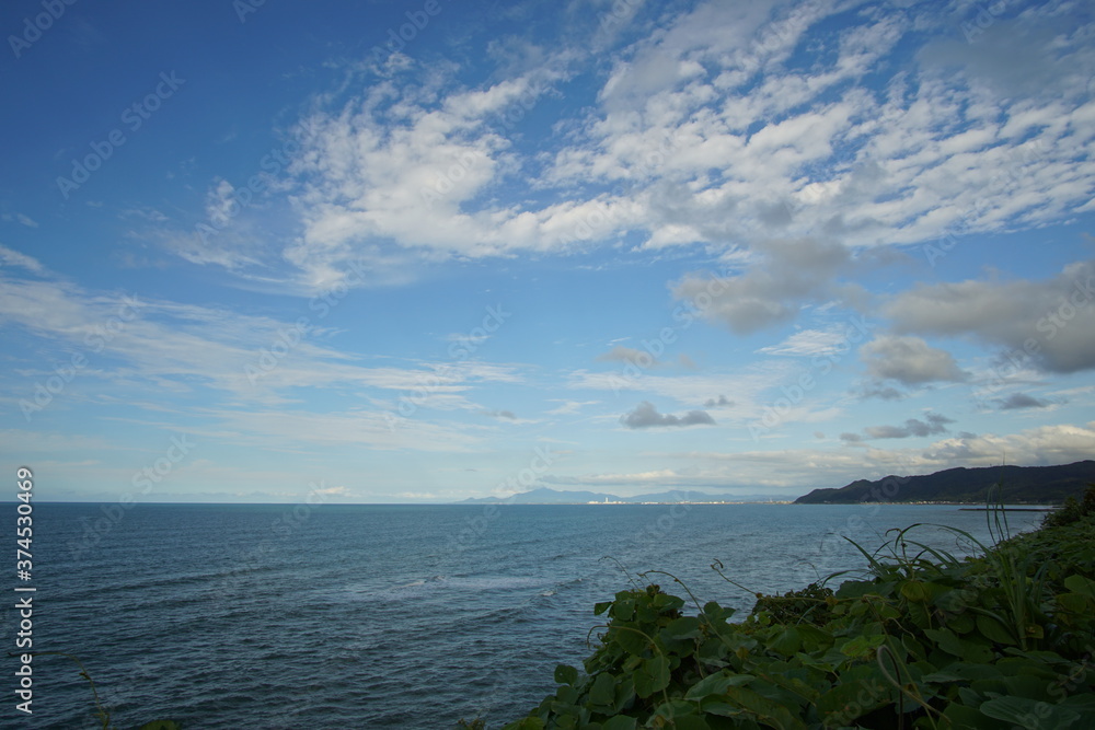 perfect blue sky with clouds and water of the sea perfect blue sky with clouds and water of the sea