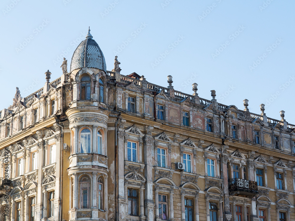 Ancient historical destructible building. Old architecture, broken glass