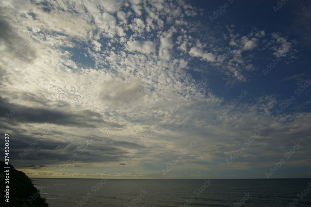 Obraz premium blue sea and cloudy sky over it. Blue Sea sky and Clouds