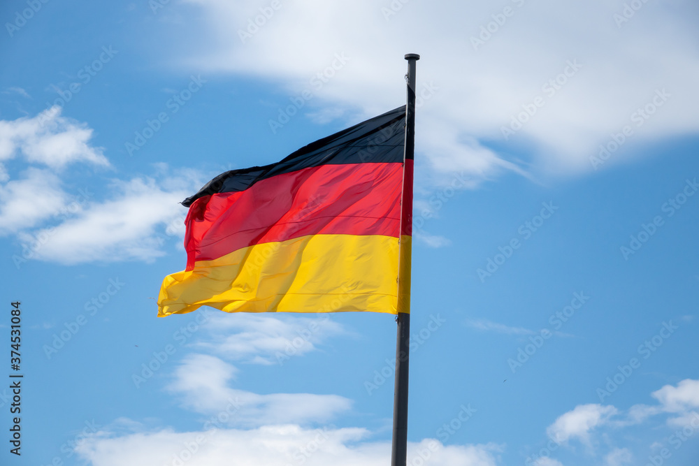 Flagge von Deutschland weht im Wind in Berlin. Flagge von Deutschland weht im Wind in Berlin.