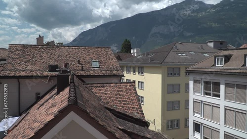 Cityscape of Chur, Switzerland, Europe - rooftops with mountain in the background