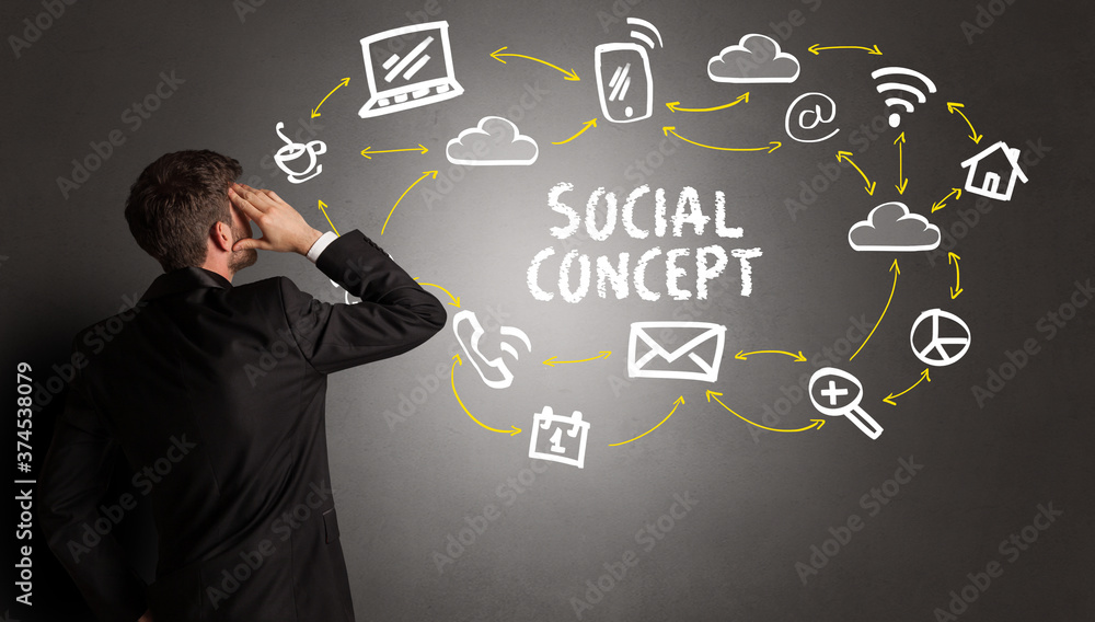 businessman drawing social media icons with SOCIAL CONCEPT inscription, new media concept businessman drawing social media icons with SOCIAL CONCEPT inscription, new media concept