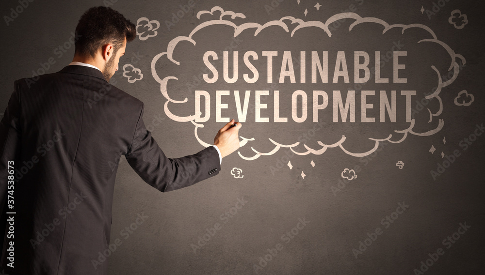 businessman drawing a cloud with SUSTAINABLE DEVELOPMENT inscription inside, modern business concept businessman drawing a cloud with SUSTAINABLE DEVELOPMENT inscription inside, modern business concept