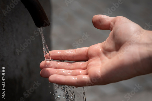 water flowing from a hand