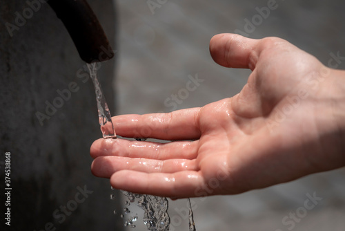 Photography water flowing from a hand