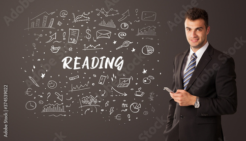 Businessman thinking with READING inscription, business education concept