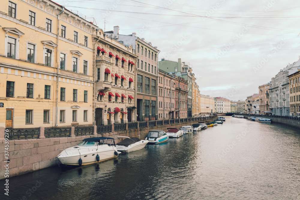 Scenic view to the quay with docked ships in Saint Petersburg, Russia.