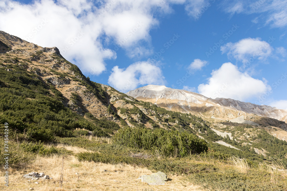 Beautiful authentic rocky landscape of the Pyrenees. Bulgaria. Natural mountain landscape as background. Beautiful authentic rocky landscape of the Pyrenees. Bulgaria. Natural mountain landscape as background.