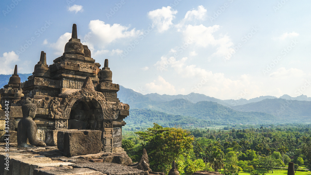 Borobudur Temple in Indonesia, South East Asia, UNESCO World Heritage Site, blue sky and sunny warm weather in summer, best season to visit Indonesia, sightseeing tour Borobudur Temple in Indonesia, South East Asia, UNESCO World Heritage Site, blue sky and sunny warm weather in summer, best season to visit Indonesia, sightseeing tour