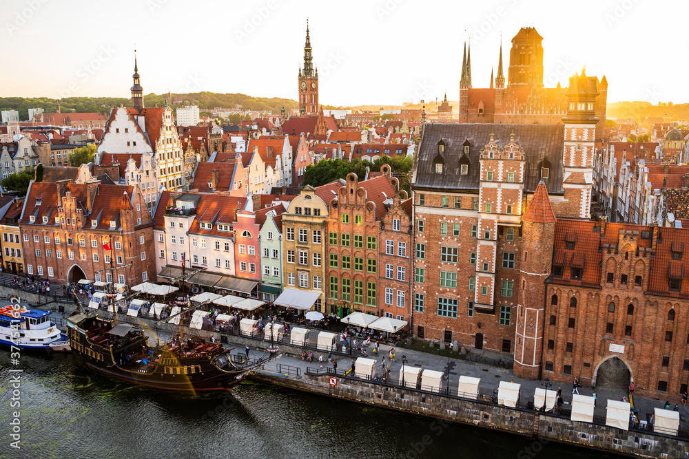 Gdansk, North Poland : Wide angle panoramic aerial shot of Motlawa river embankment in Old Town during sunset in summer