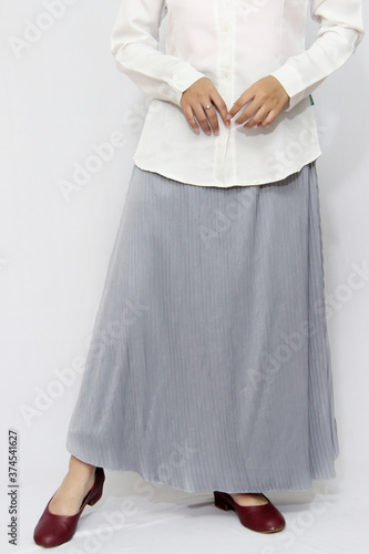 Closeup of grey skirt with isolated white background. catalogs to sell in online fashion stores photo