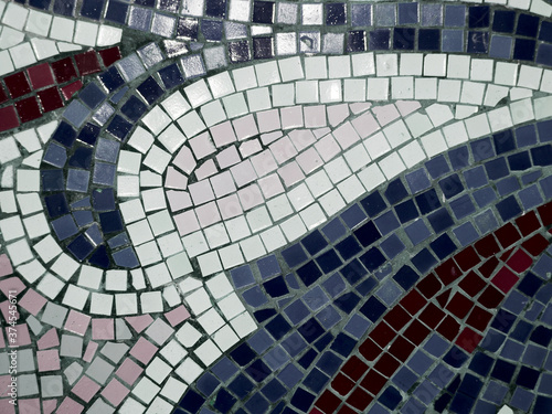 Detail of beautiful old collapsing abstract ceramic mosaic adorned building. Venetian mosaic as decorative background. Selective focus. Abstract Pattern. Abstract mosaic colored ceramic stones